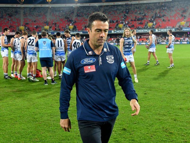 Geelong's Chris Scott marked his 200th game as an AFL coach with a 27-point win over the Gold Coast.
