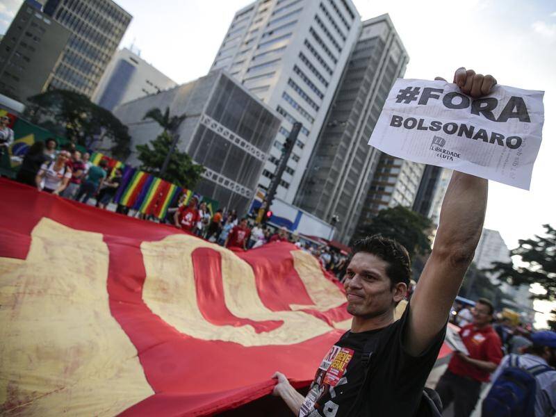 Brazilians have protested over pension and budget cuts amid discontent over an economic downturn.