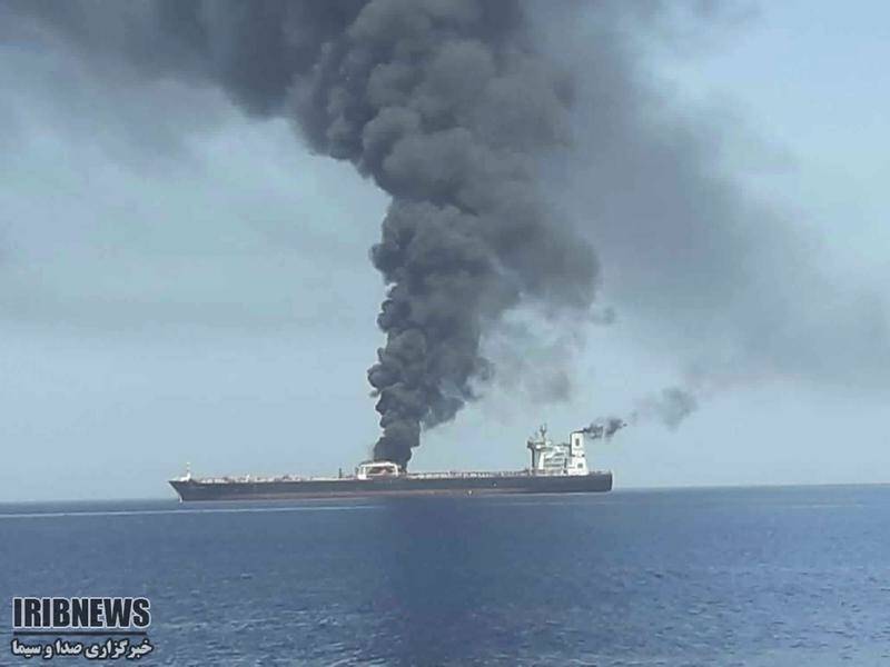Two oil tankers near the Strait of Hormuz have been attacked, with the crews safely evacuated.