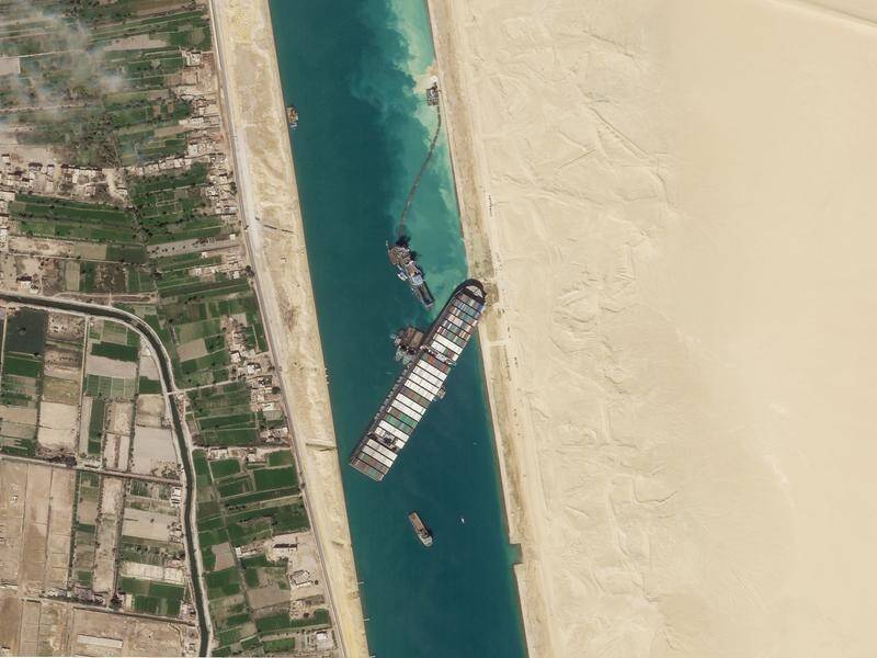 Officials have battled since Tuesday to release the wedged ship Ever Given in the Suez Canal.