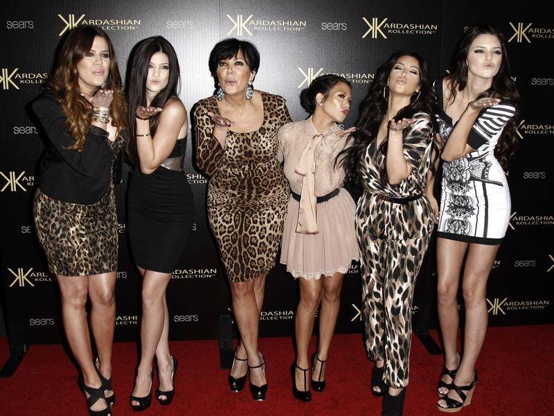 Kim Kardashian (2nd from right) says she feels lucky she gets to work with her family every day.