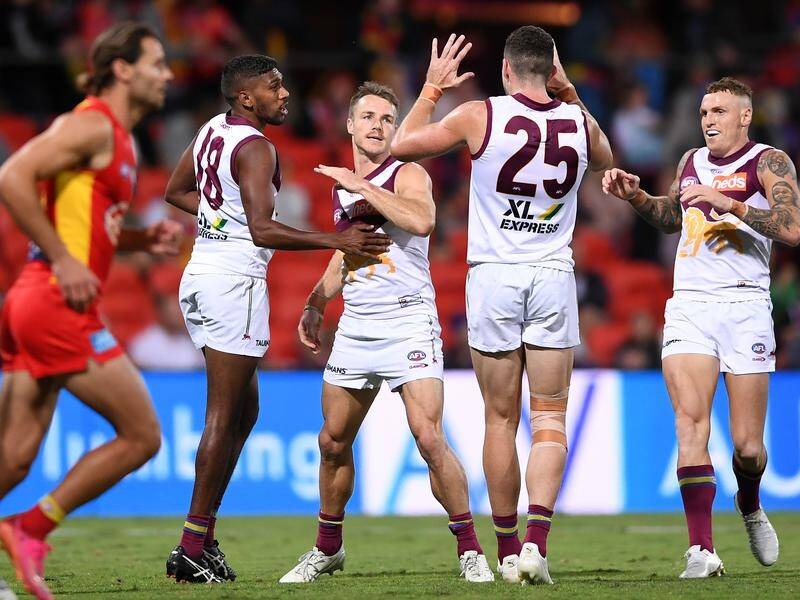 Brisbane have consolidated their spot in the AFL top eight with a 73-point thrashing of Gold Coast.