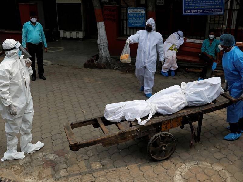 India's coronavirus death toll has surpassed 20,000.