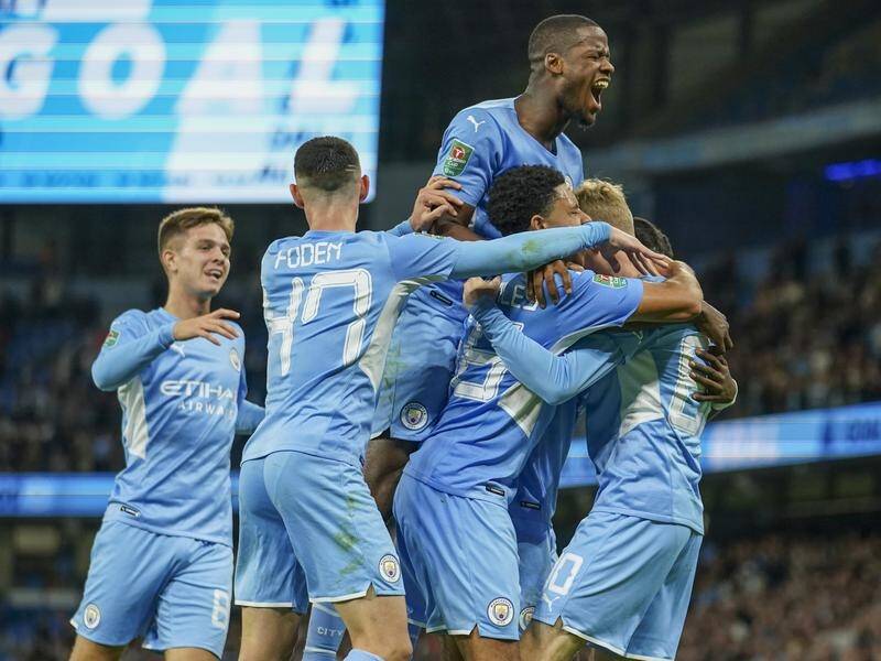 Manchester City celebrate Cole Palmer's goal in their English League Cup win over Wycombe Wanderers.