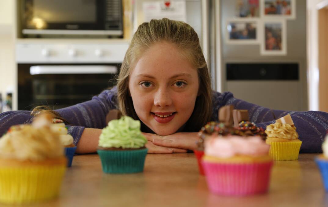 Jerrabomberra teenager Jade Esler has started a cupcake business to help fund her dream to become a pilot. Photo: Kim Pham.