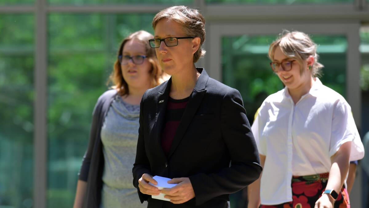 Australian Council of Trade Unions secretary Sally McManus (centre) wants to meet with the Prime Minister over worker protections during the Omicron surge. Picture: Getty Images