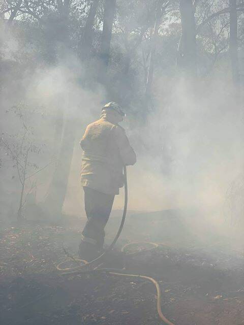A firefighter assisting with the fires in the Snowy Valleys in the past few weeks. Photo: C. Kremp (NSW RFS)