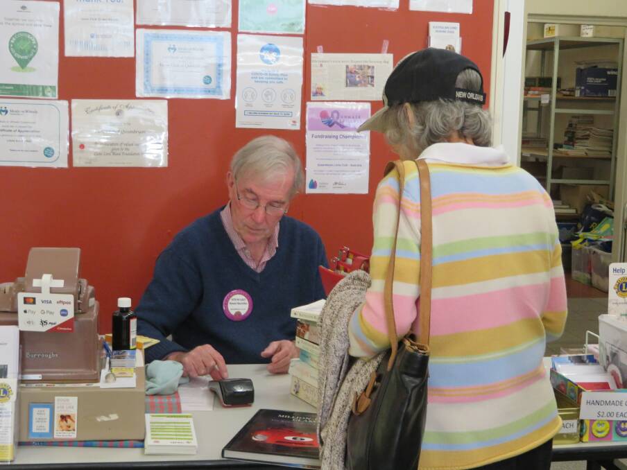 All the volunteers of the Lions Club of Queanbeyan Community Bookshop are hard working. Photo: supplied. 