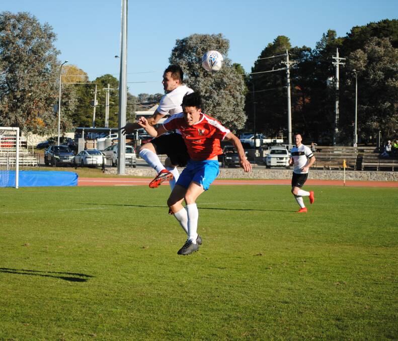 Contest: Queanbeyan City FC and the White Eagles played out a fascinating 2-2 draw. 