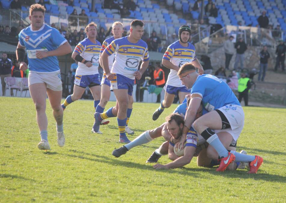 Pressure: The Queanbeyan Blues were in the grind for the majority of the game and snuffed out plenty of Bulldogs' attacks. Photo: Burney Wong. 