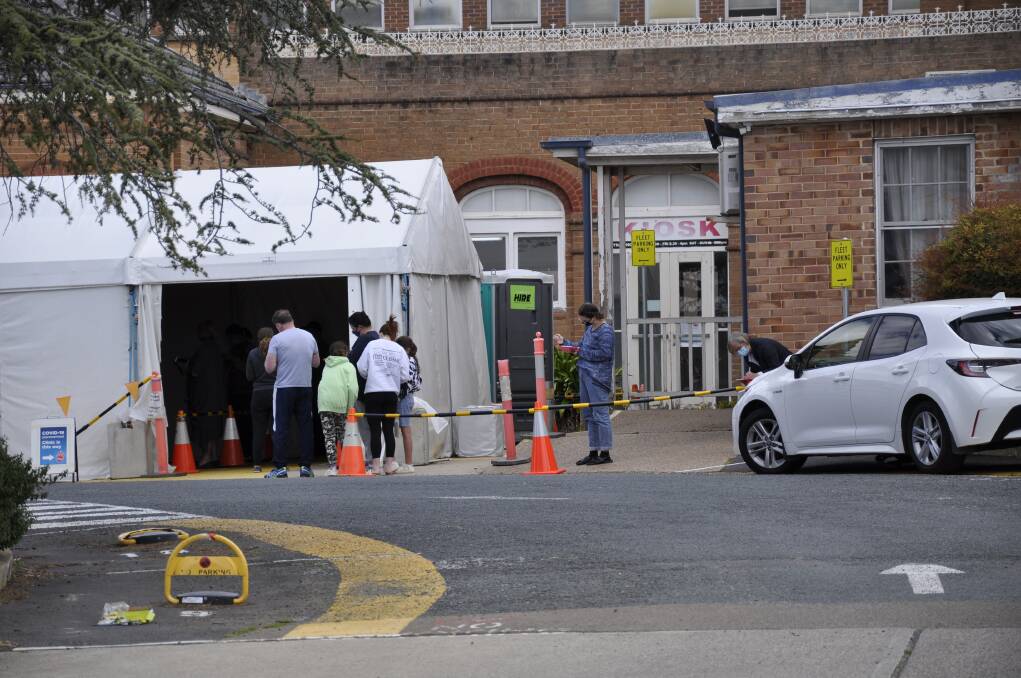 People queue up for testing at Goulburn Base Hospital on Sunday. Photo: Louise Thrower.