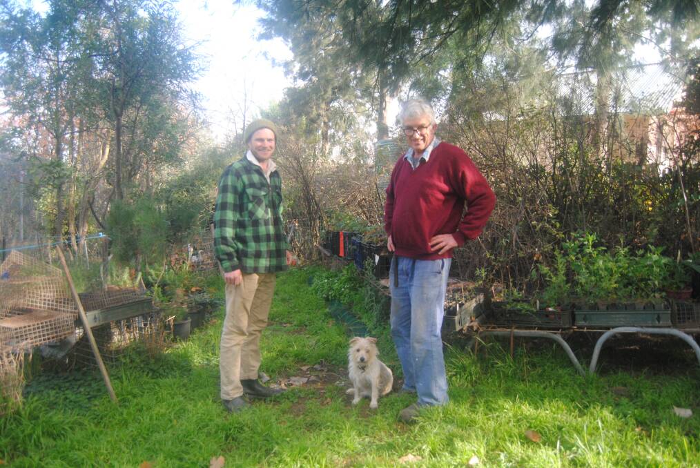 Millpost Farm's David Watson and his son Harry talk about climate change. Photo: Neha Attre
