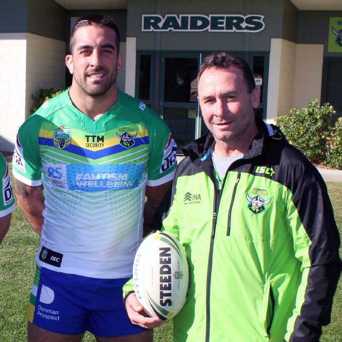 Paul Vaughan joins Raiders coach Ricky Stuart in raising awareness for autism. Photo: Supplied. 