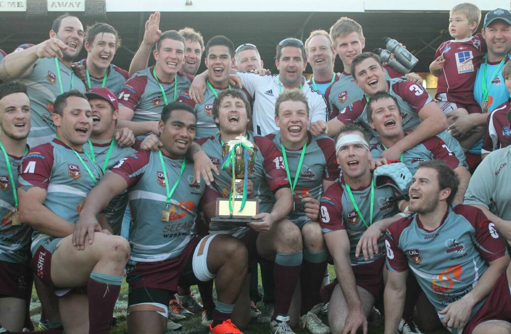 2013 Canberra Raiders Cup premiers. The Queanbeyan Kangaroos celebrate the side's 17-16 grand final victory over the Blues at Seiffert Oval on Sunday. Photo: Andrew Johnston, Queanbeyan Age
