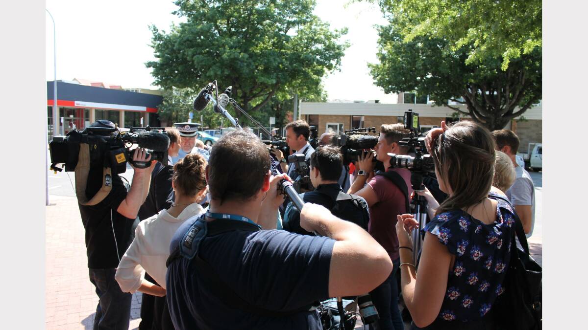 The media scrum surrounding Mr Abbott. Photo: Andrew Johnston