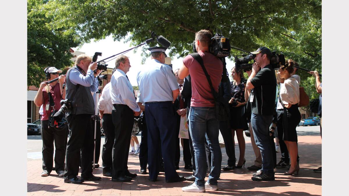 The media scrum surrounding Mr Abbott. Photo: Andrew Johnston