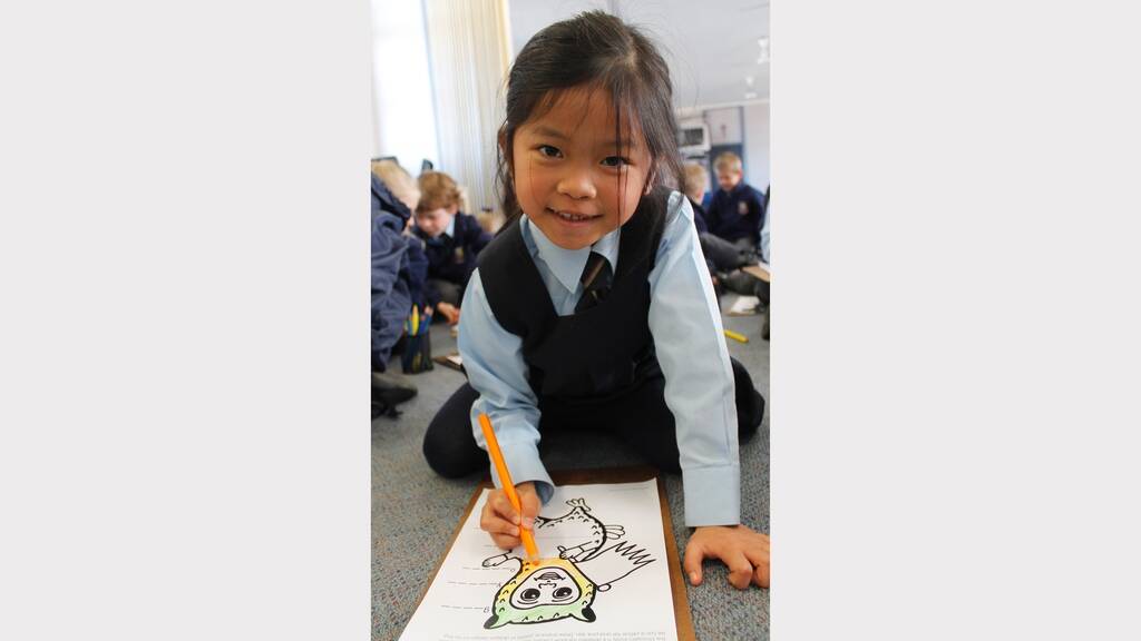 Author and illustrator Cameron Stelzer visits St Gregory's Primary School. Photos: Kim Pham and Sam Jeacle.