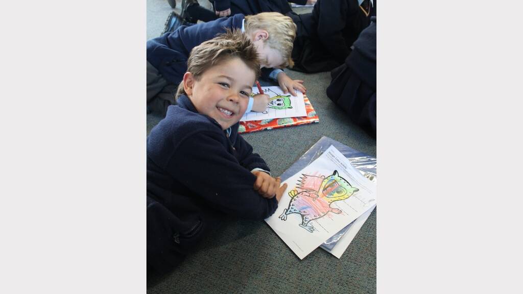 Author and illustrator Cameron Stelzer visits St Gregory's Primary School. Photos: Kim Pham and Sam Jeacle.